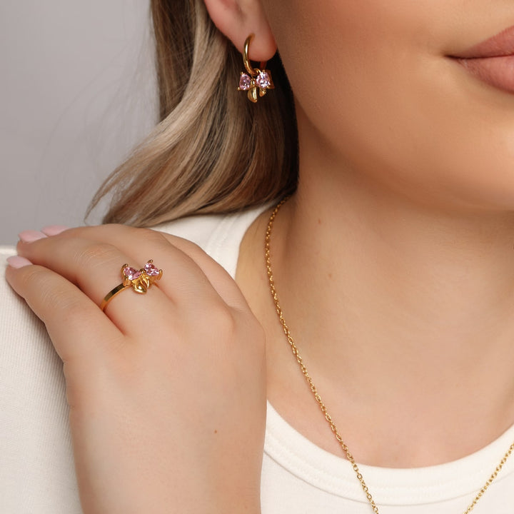Schmuck mit Rosa Steinchen Schleife wasserfest Edelstahl