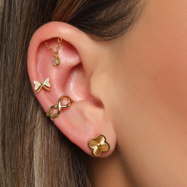 Ohrpiercing Schleife Titan gold glitzer Damen