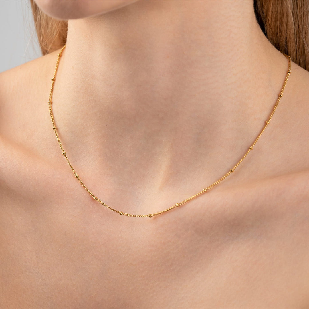 dezente Kette 18K vergoldet mit Kügelchen filigran